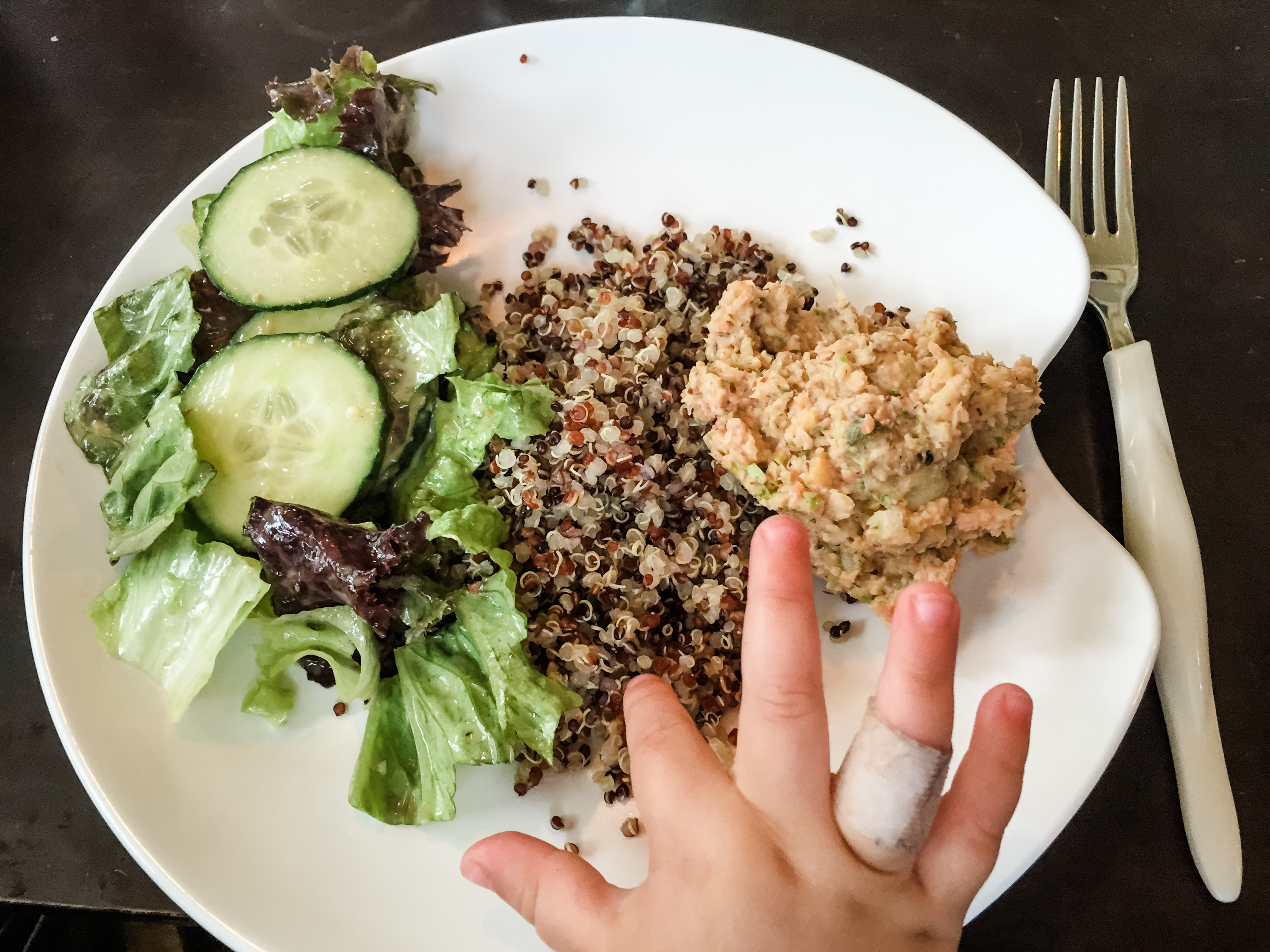 Vegan meal for baby: quinoa, chickpea salad, and garden salad